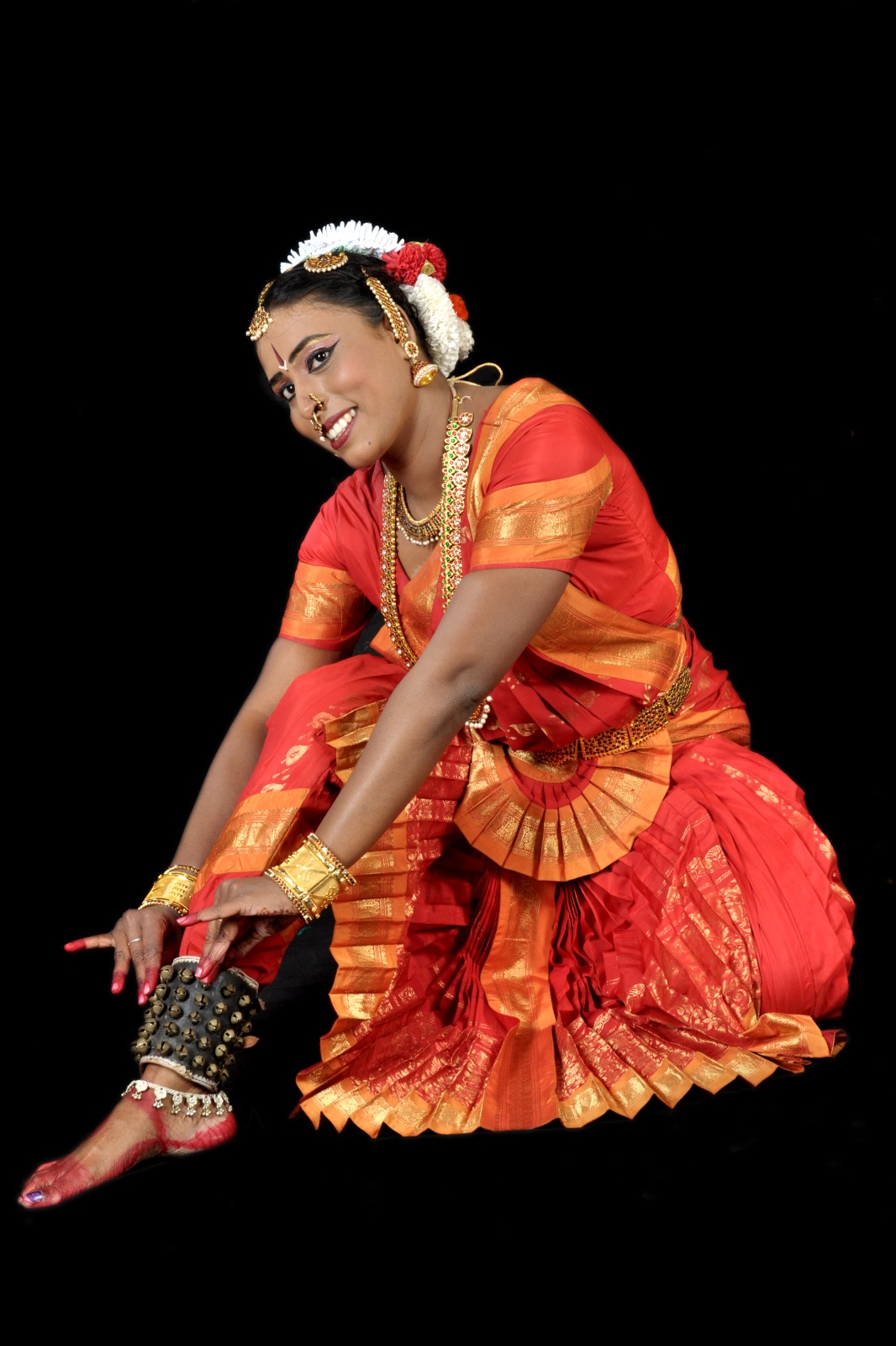 Bharatanatyam dancer in performance pose
